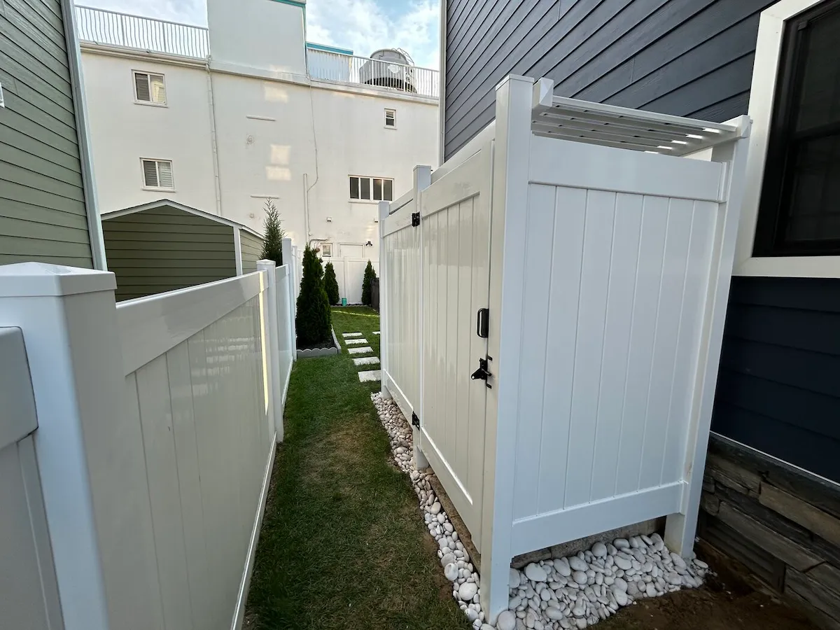Wildwood Crest NJ outdoor shower white vinyl enclosure stepping stones